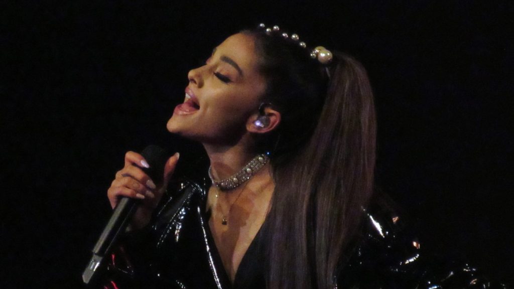 Ariana Grande performing at the concert.