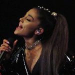 Ariana Grande performing at the concert.