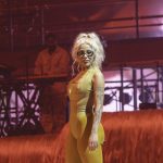 Doja Cat performing at a live event.