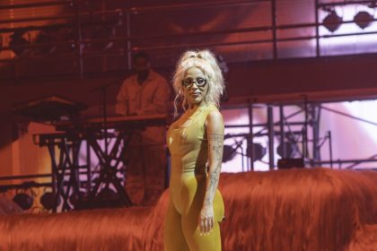 Doja Cat performing at a live event.