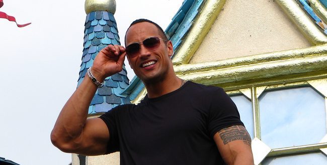Dwayne Johnson giving an interview at Disney Land.