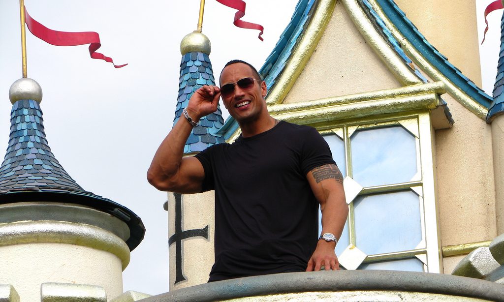 Dwayne Johnson giving an interview at Disney Land.