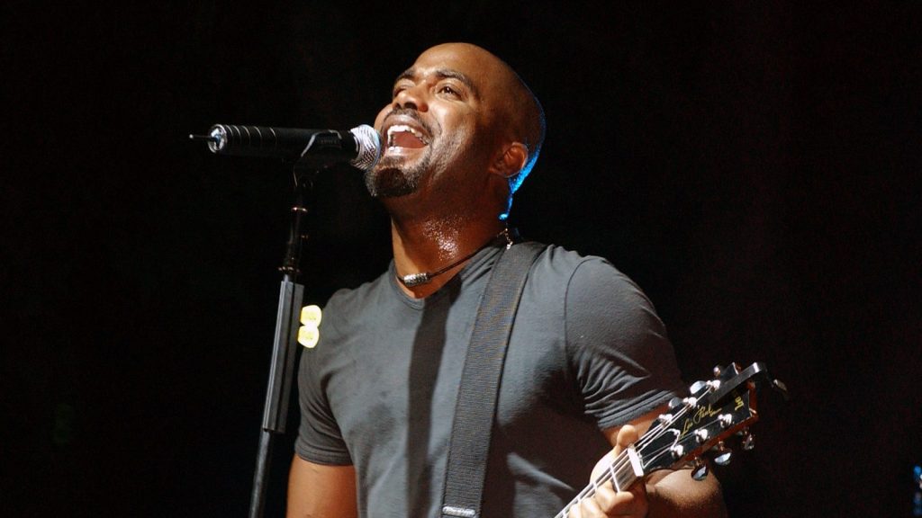 Darius Rucker performing live at the concert.