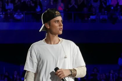 Justin Bieber performing at the live concert.