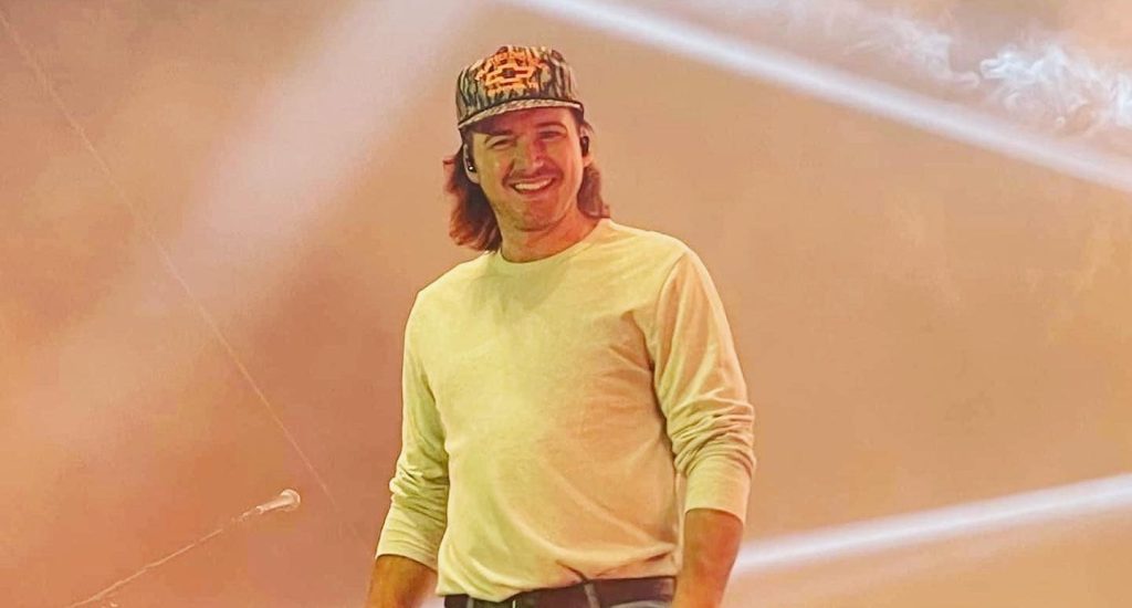 Morgan Wallen performing at a live concert.