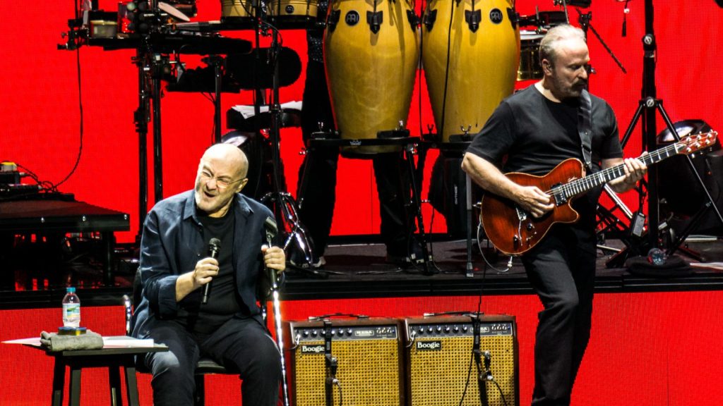 Phil Collins performing live.