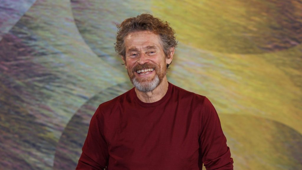 Willem Dafoe at an event.