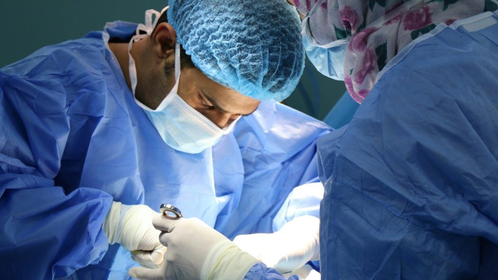 Doctors doing an operation.