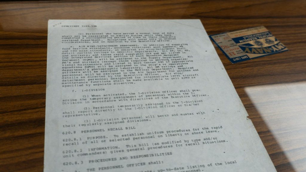 A movie script kept on a wooden surface.