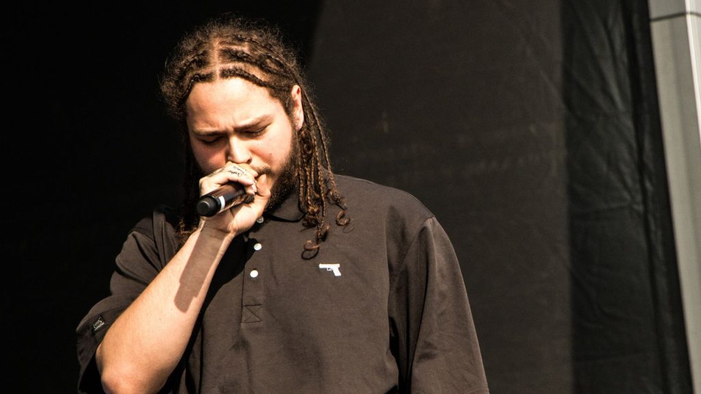 Post Malone performing live.