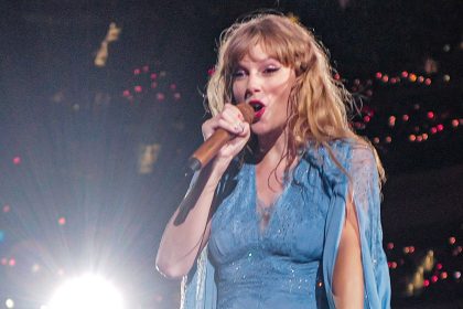 Taylor Swift performing at the concert.