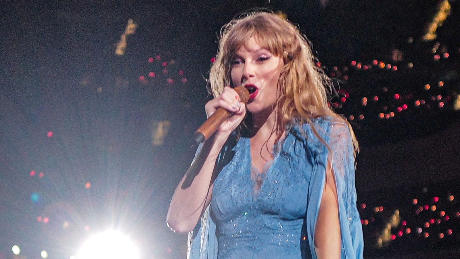 Taylor Swift performing at the concert.