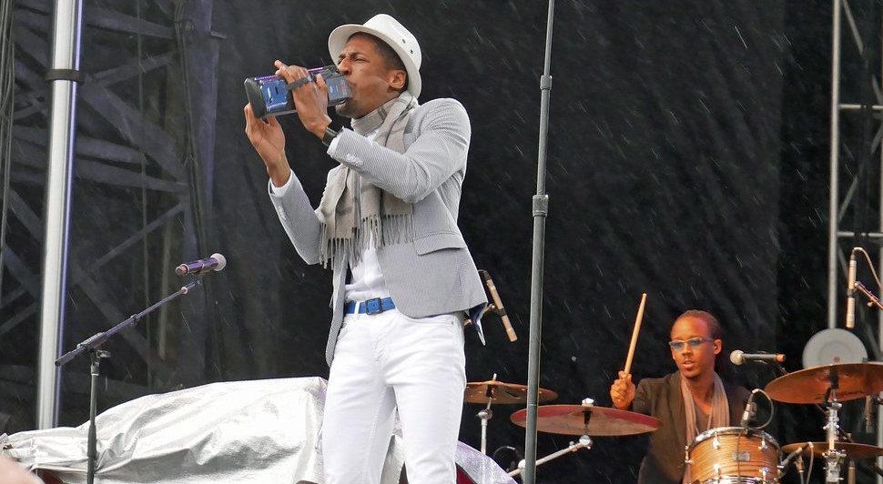 Jon Batiste performing live.