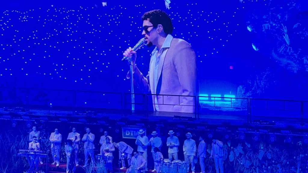 Bad Bunny performing live at an event.