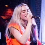 Billie Eilish performing live.