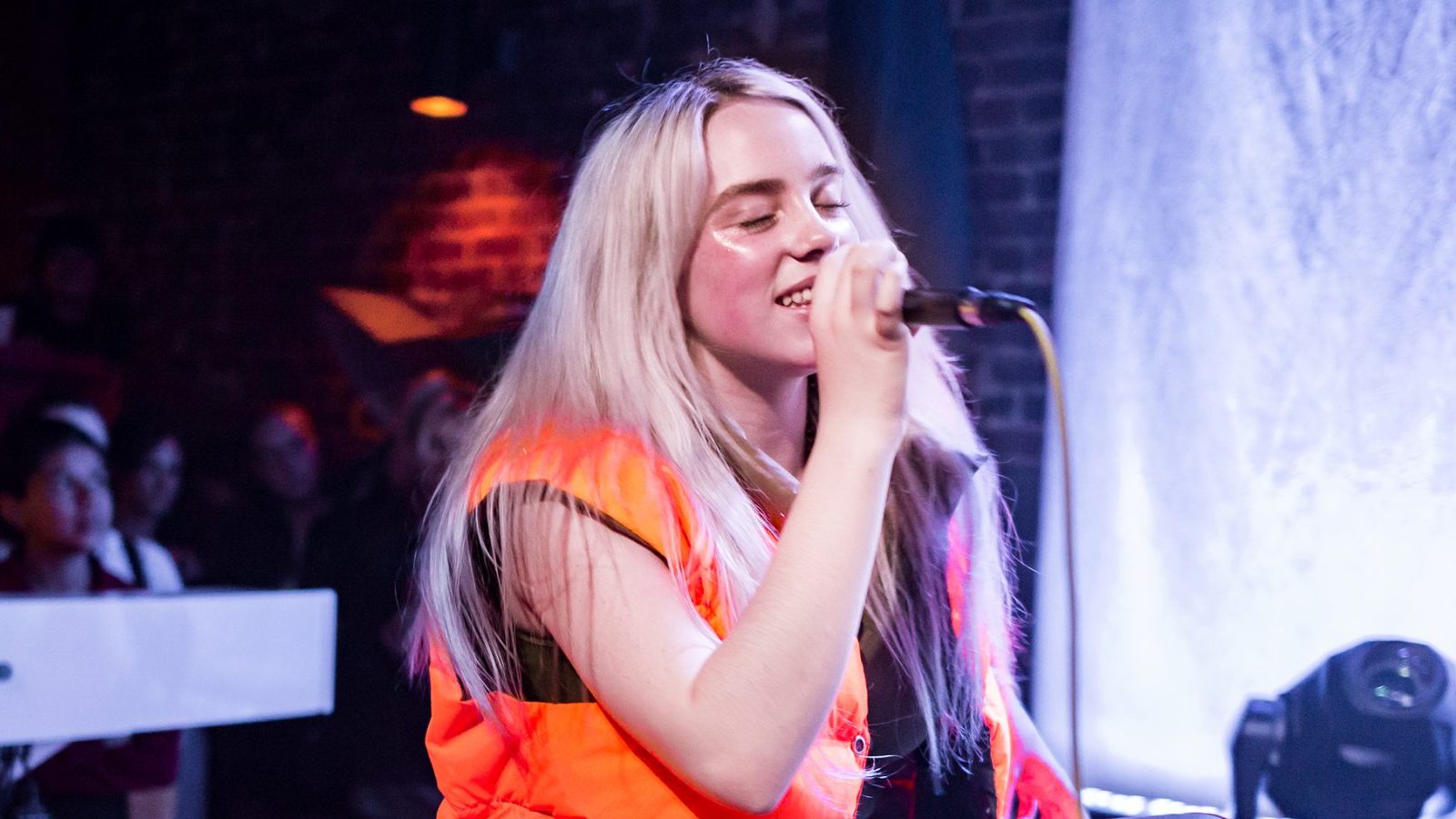 Billie Eilish performing live.
