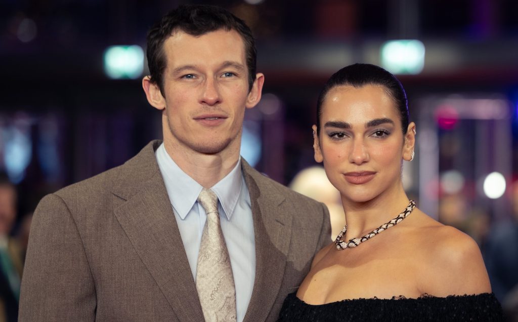 Callum Turner and Dua Lipa at the red carpet event.