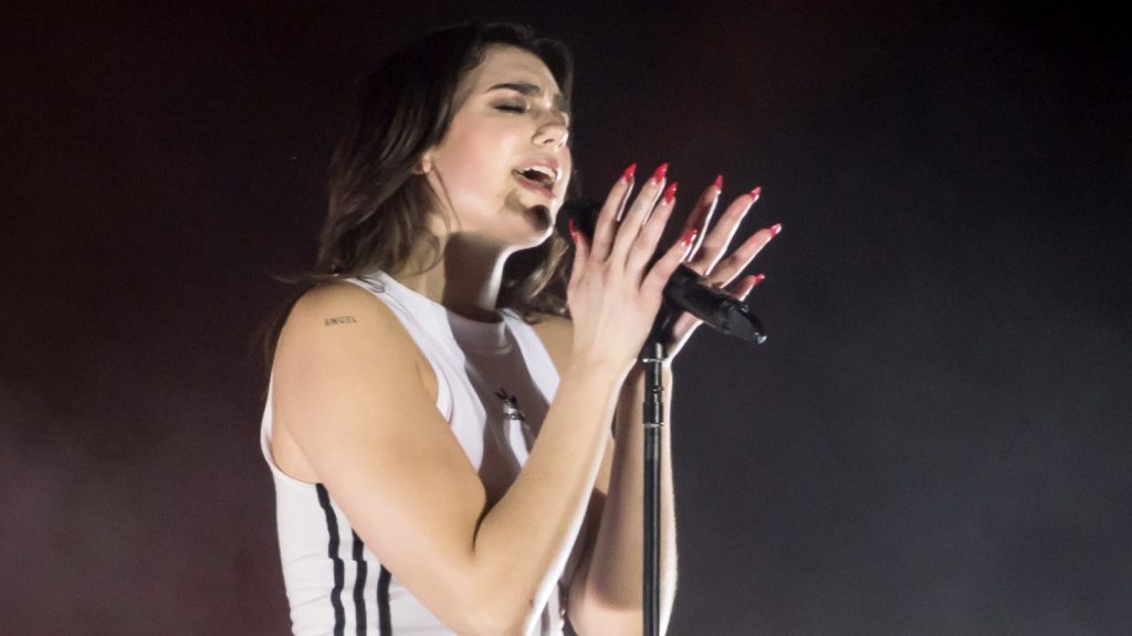 Dua Lipa performing live.