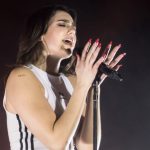 Dua Lipa performing live.