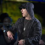 Eminem performing at a live concert.