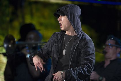 Eminem performing at a live concert.