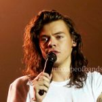 Harry Styles performing at the