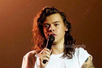 Harry Styles performing at the
