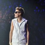 Justin Bieber performing at the live concert.