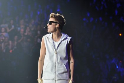 Justin Bieber performing at the live concert.