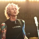 Machine Gun Kelly performing live.