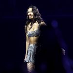 Olivia Rodrigo performing live.