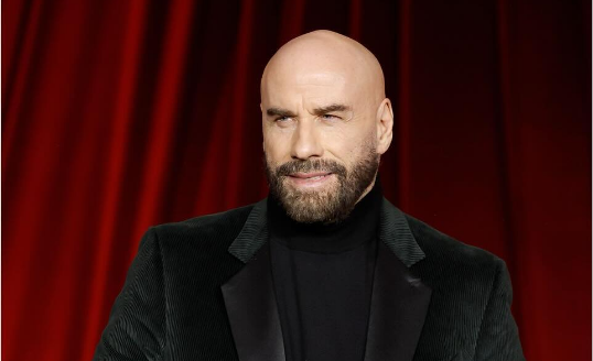 John Travolta at an event.