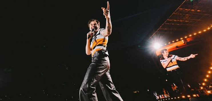Harry Styles performing live.