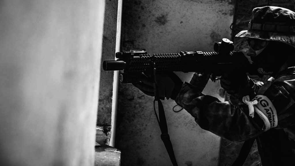 A soldier holding a rifle.