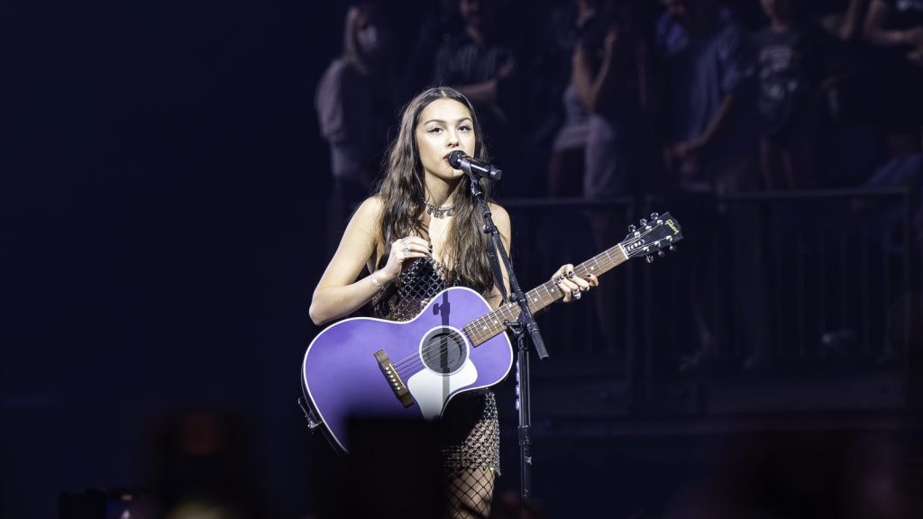 Olivia Rodrigo performing live.