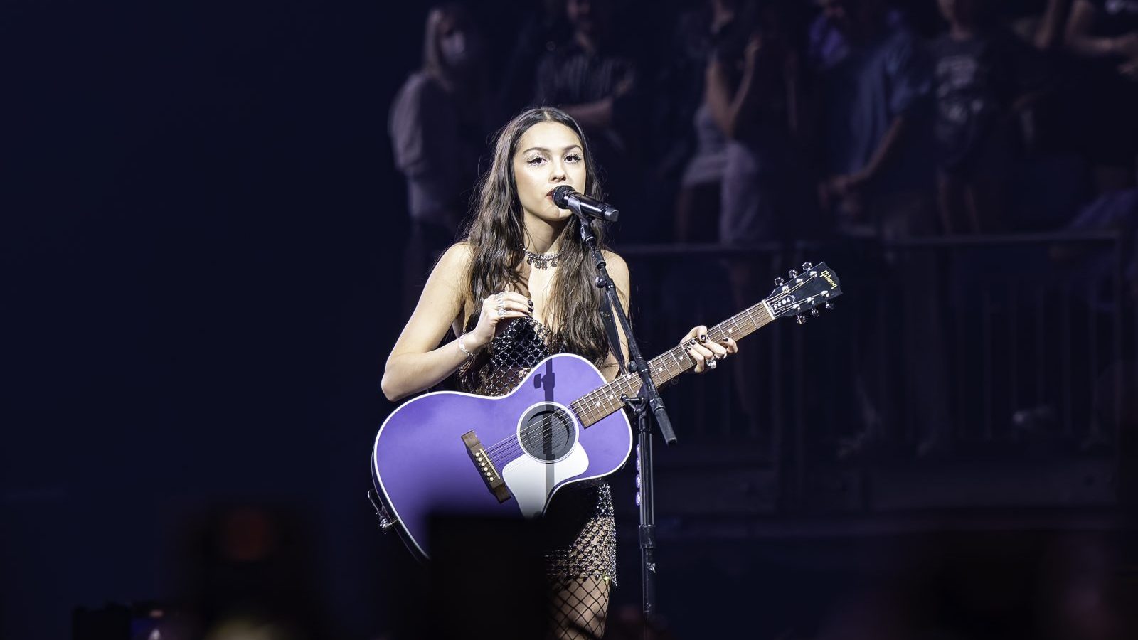 Olivia Rodrigo performing live.