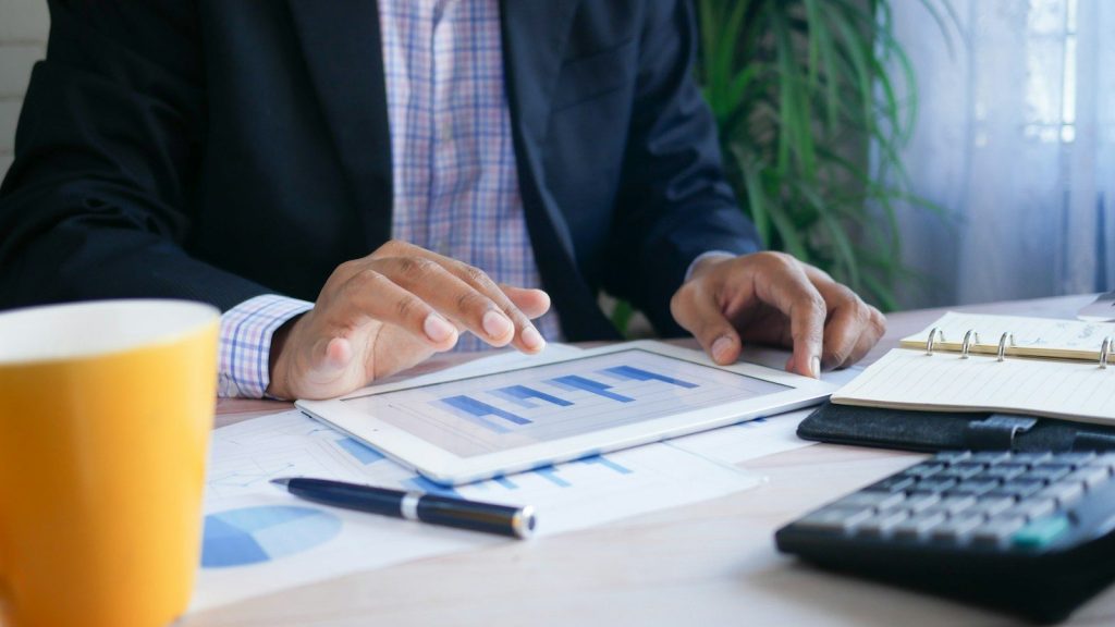 A businessman reviewing financial charts.