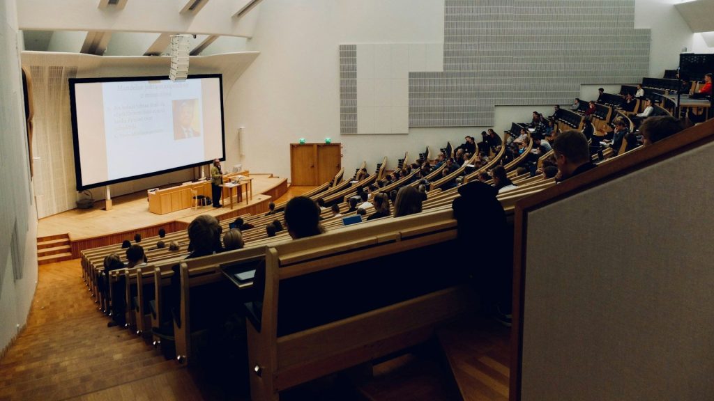 University lecture hall with students.